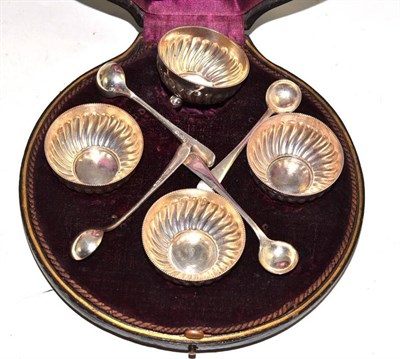 Lot 364 - A set of four cased salts and four spoons