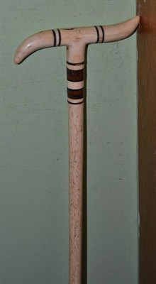 Lot 375 - A bone shafted walking stick