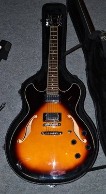 Lot 382 - An Ibanez Artcord cello bodied guitar, in a hard case with stand