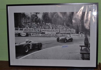 Lot 448 - Photograph of Jack Brabham and Stirling Moss, signed by Jack Brabham