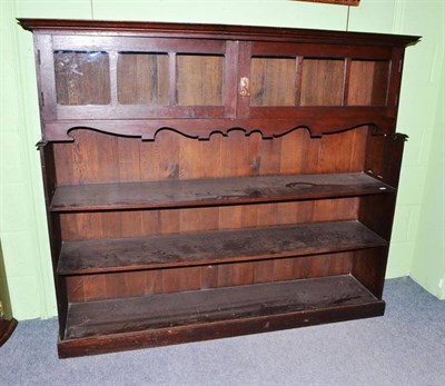 Lot 478 - An Arts & Crafts oak open bookcase by Wylie & Lochhead, Glasgow