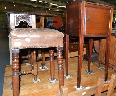 Lot 483 - A mahogany pot cupboard and a leather upholstered stool