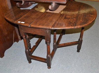 Lot 488 - A late 17th century oak gate leg table