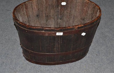 Lot 521 - Coopered log bin