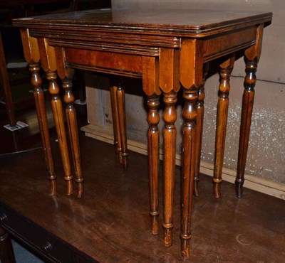 Lot 530 - A reproduction nest of three tables