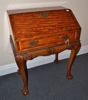 Lot 532 - A George II style satinwood bureau