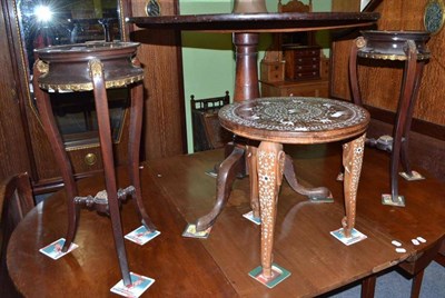 Lot 544 - A mahogany tripod table, a pair of plant stands in Empire style, an inlaid occasional table and two