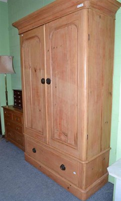 Lot 549 - An Edwardian stripped pine wardrobe, a similar dressing table and miniature chest of drawers