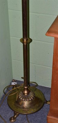 Lot 565 - An Edwardian adjustable brass standard lamp