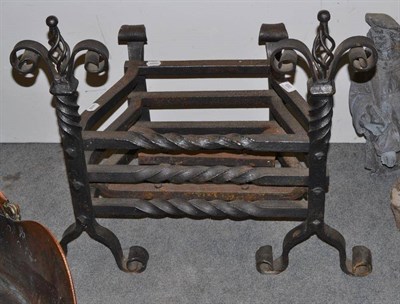 Lot 680 - Wrought iron fire grate