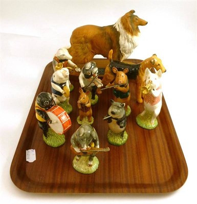 Lot 16 - A Beswick nine piece Pig Band, Beswick Rough Collie on wood base and a Beswick Airedale Terrier...