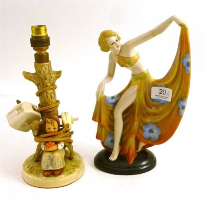 Lot 20 - Goldscheider-type figure and a Hummel lamp