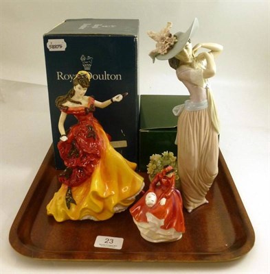 Lot 23 - Two Royal Doulton figures 'Belle' and 'Emma' and a Lladro figure (3)