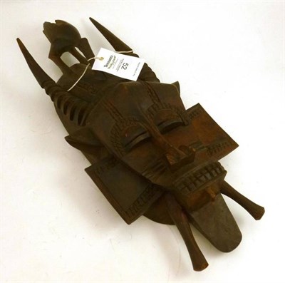 Lot 52 - A Sunefo, Ivory Coast carved wood mask
