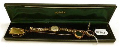 Lot 63 - A lady's 9ct gold wristwatch by Rotary; a 9ct gold June calendar pendant; a 9ct gold cornelian...