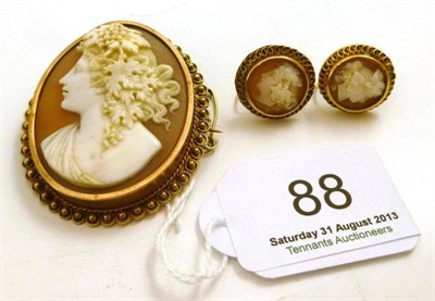 Lot 88 - A cameo brooch depicting Bacchus and a pair of cameo earrings