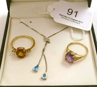 Lot 91 - A 9ct gold amethyst ring, a 9ct citrine and diamond cluster ring and a 9ct white gold blue...