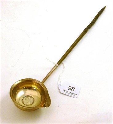 Lot 98 - A George III toddy ladle inset with a coin