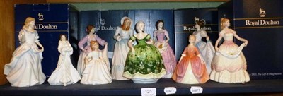 Lot 121 - Nine Royal Doulton figures and a Coalport figure, boxed (10)