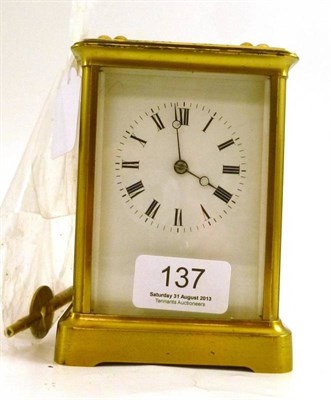 Lot 137 - A brass Corniche cased carriage timepiece with English lever escapement and key (working order)