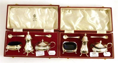 Lot 151 - Two sets of silver condiments (in red cases)