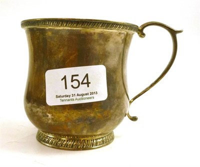 Lot 154 - An American silver coloured metal mug, stamped 'J Curry Phila.'