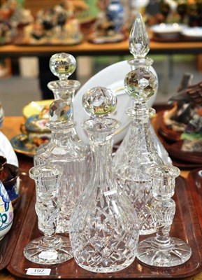 Lot 197 - Five cut glass decanters and stoppers and a pair of cut glass candlesticks