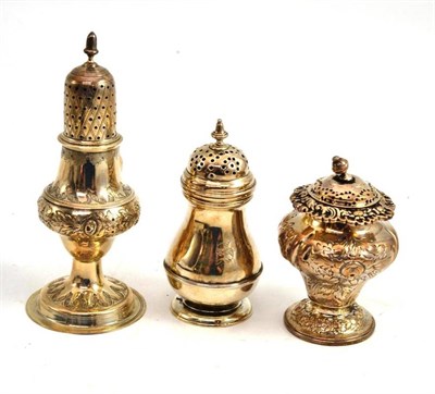 Lot 228 - Three silver pepperettes