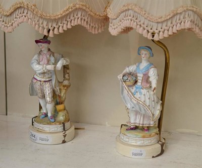 Lot 244 - Pair of porcelain figural lamps