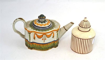 Lot 268 - A pearlware tea pot and a Cambrian pottery creamware tea caddy and cover