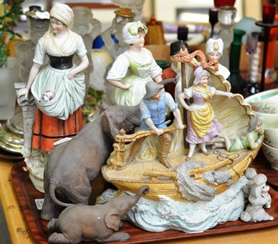 Lot 275 - A Continental bisque porcelain figure group of figures in a fishing boat, five various other bisque