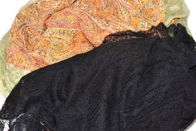 Lot 310 - Woven silk shawl with an orange patterned centre and green floral edging, 190cm by 100cm; and...