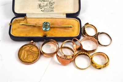 Lot 329 - A collection of 9ct and 18ct gold rings, a pendant and a 9ct gold bar brooch set with synthetic...