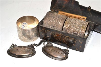 Lot 339 - Two labels, three napkin rings and a tortoiseshell case (a.f.)