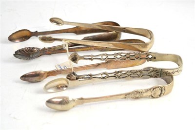 Lot 344 - Five pairs of silver sugar tongs