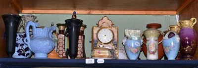 Lot 354 - A shelf of decorative ceramics including a plaque painted with a view of Little Moreton Hall,...