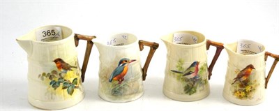 Lot 365 - A composite set of four Royal Worcester jugs