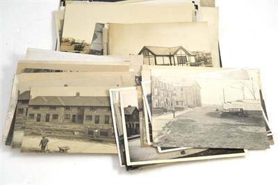 Lot 371 - A collection of photographs, including construction work at Morecambe