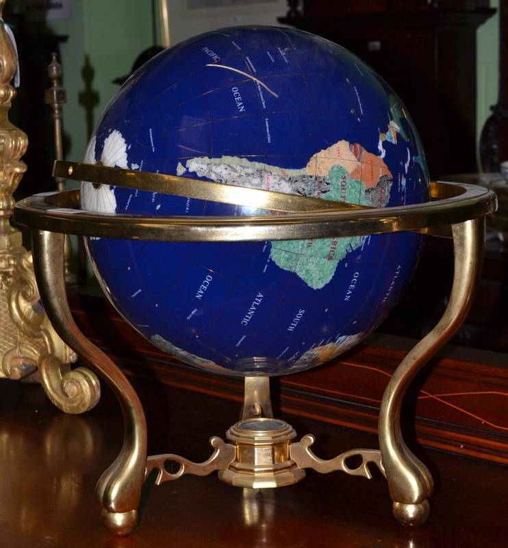 Lot 392 - A Franklin Mint globe, on brass stand