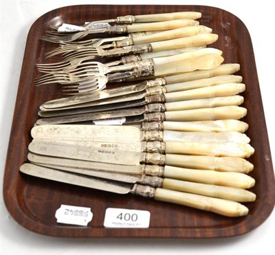 Lot 400 - Set of twelve silver dessert knives and forks with mother of pearl handles