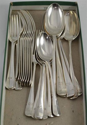 Lot 410 - A part suite of rat tail pattern silver cutlery comprising: six table forks, side forks,...