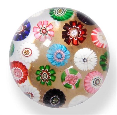 Lot 1 - A Clichy Scattered Millefiori Paperweight, circa 1850, set with assorted brightly coloured...