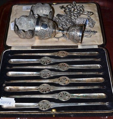 Lot 419 - A cased set of eight silver lobster picks, a silver chatelaine, a double egg cup and two salts