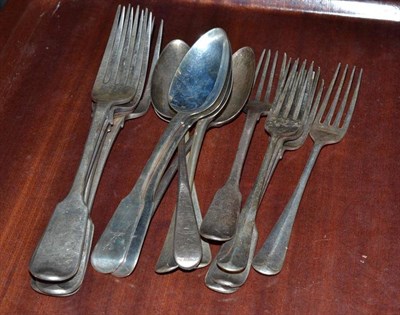 Lot 421 - Four Georgian silver table forks, five silver dessert forks and six silver dessert spoons