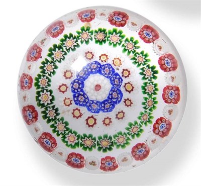 Lot 3 - A Clichy Concentric Millefiori Paperweight, circa 1850, the central cane within six rows of...