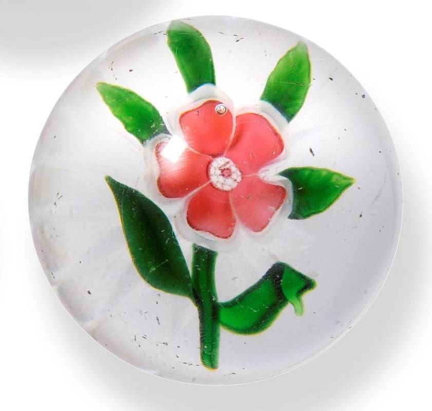 Lot 5 - A Clichy Flower Paperweight, circa 1850, the pink and white petal flower with green leaves,...