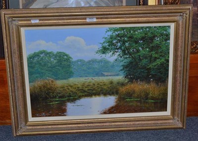 Lot 468 - A modern framed oil on canvas river landscape 39cm by 58cm