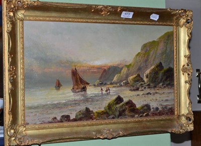 Lot 473 - Frank Hider, coastal scene with a fishing boat drawn up on the beach, oil on canvas