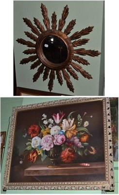 Lot 477 - 20th century still life of flowers, oil and a giltwood sunburst mirror