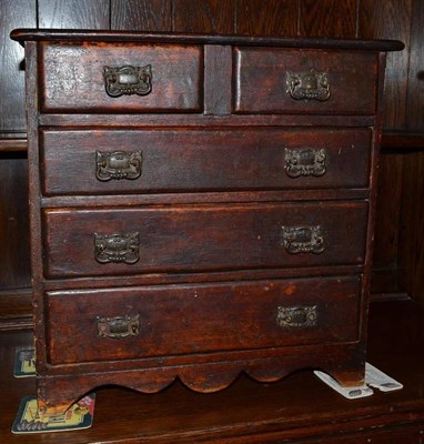 Lot 519 - Victorian miniature chest of drawers